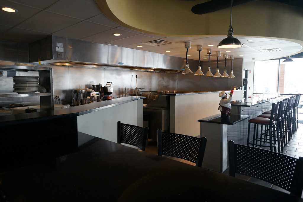 Warm inviting pizza restaurant interior with comfortable dining space